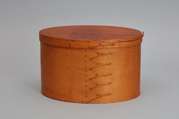 Oval box painted yellow.jpg