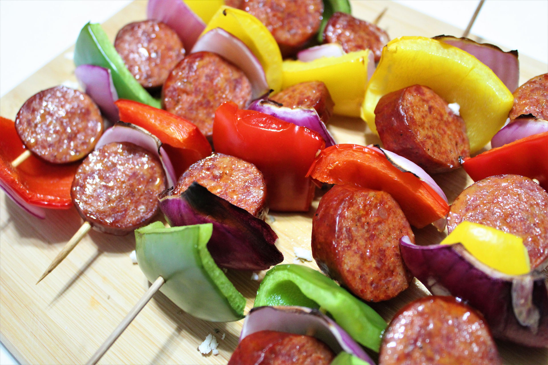 Close up of cooked Sausage, Pepper, & Onion Kebab.