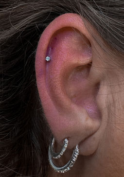 Finelinetattoo Daniëlle piercing Vorselaar