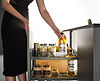 RUVO pull out pantry system installed inside a kitchen cabinet