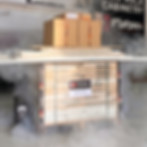 Flat pack cut-to-size cabinetry stacked on pallet.