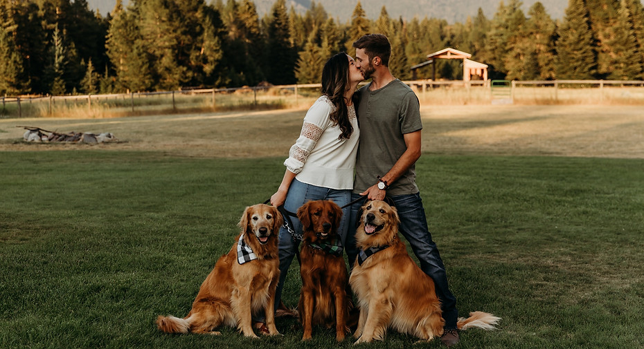 Mackenzie Dougherty with her hubby and golden retrievers