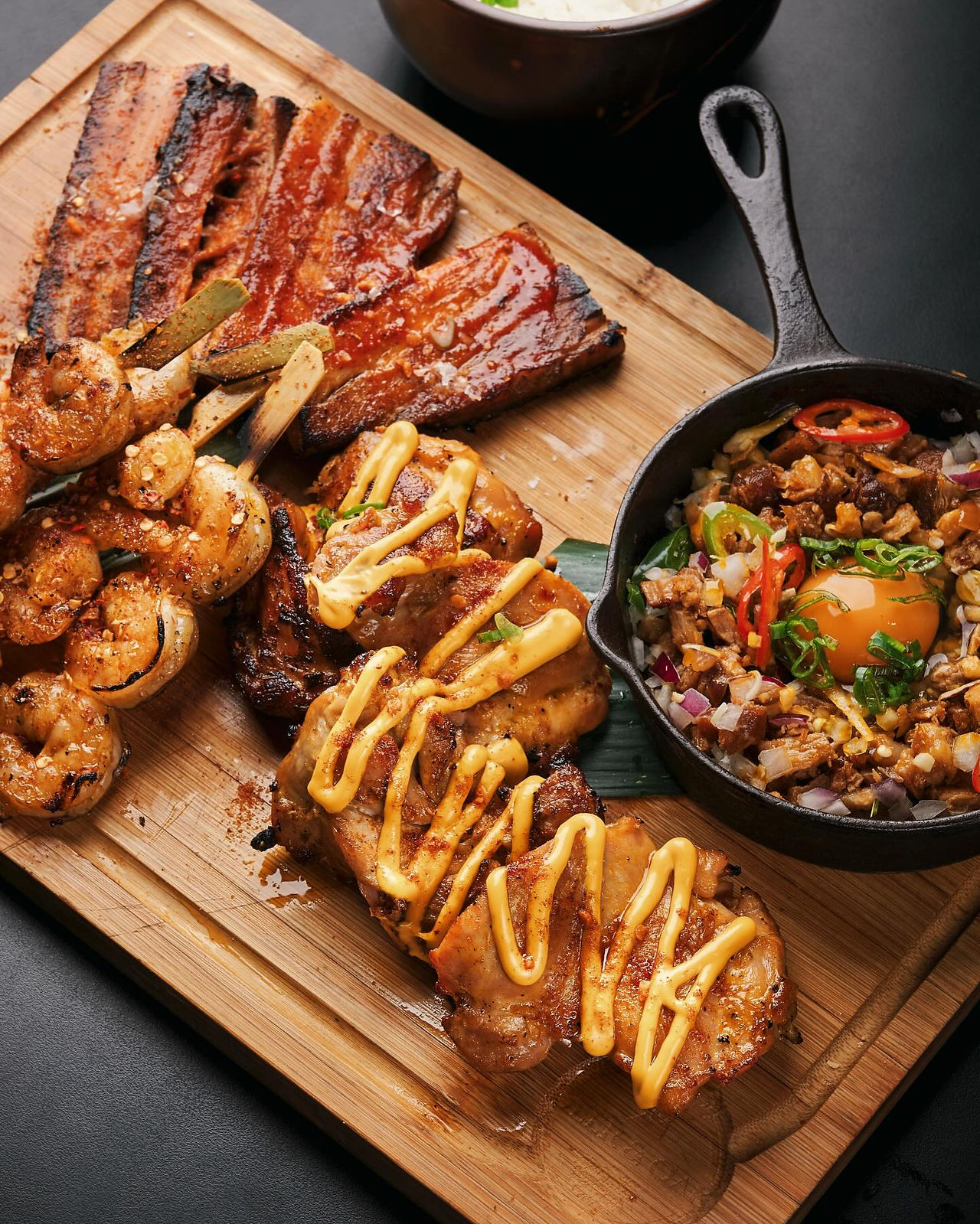 Kasa and Kin Filipino restaurant Soho London chicken inasal skewers with grilled meats and garlic rice