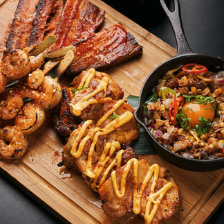 Kasa and Kin Filipino restaurant Soho London chicken inasal skewers with grilled meats and garlic rice