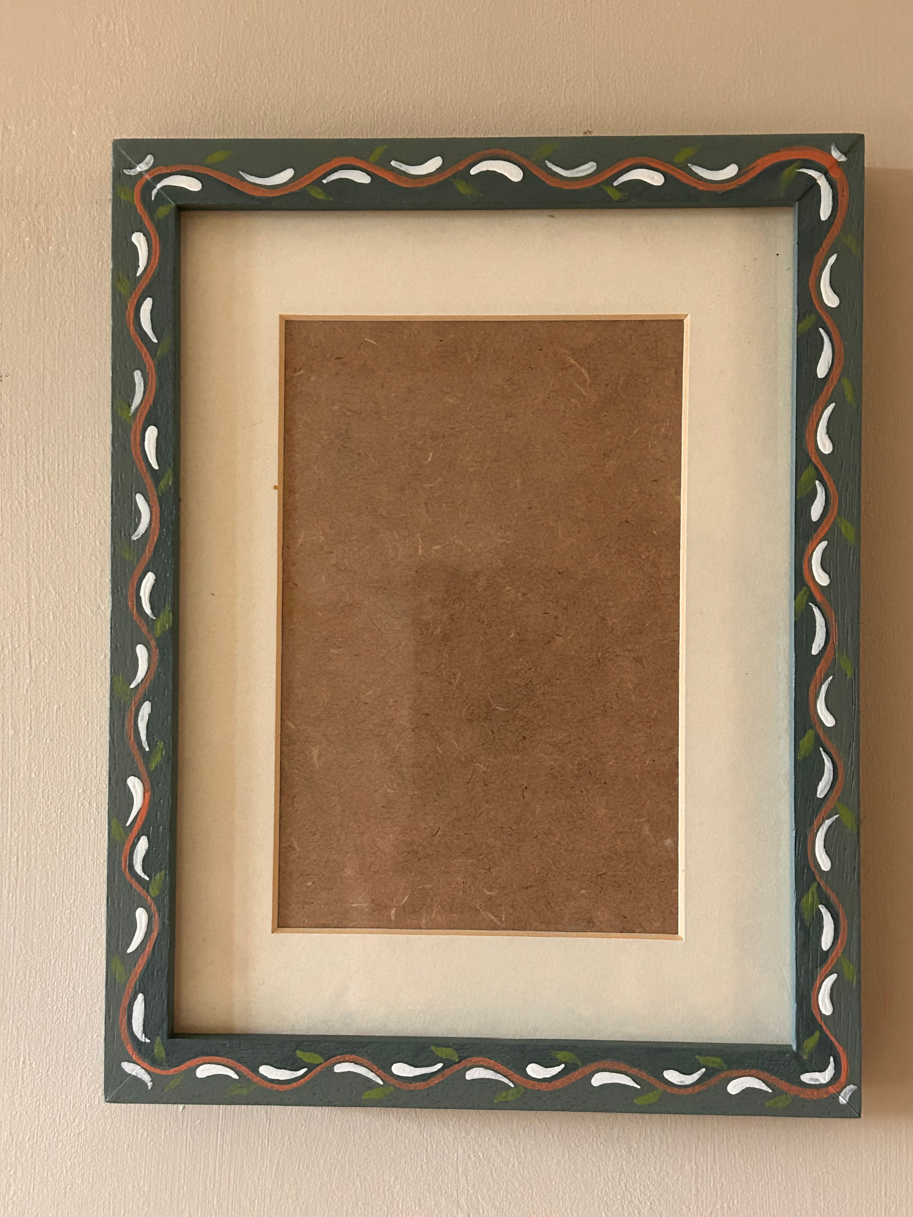 Grey-green vine frame