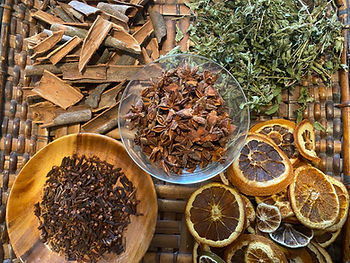 A basket of dry ingredients for a simmer pot