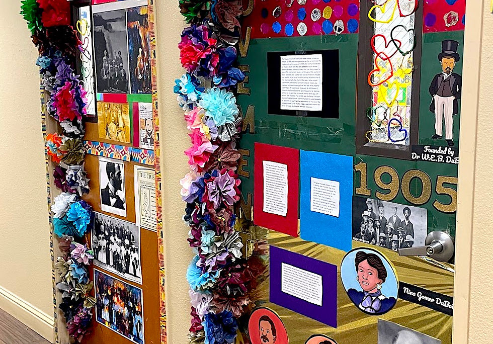 A brightly colored and decorated classroom door at Aurum Preparatory Academy in celebration of Black History Month.