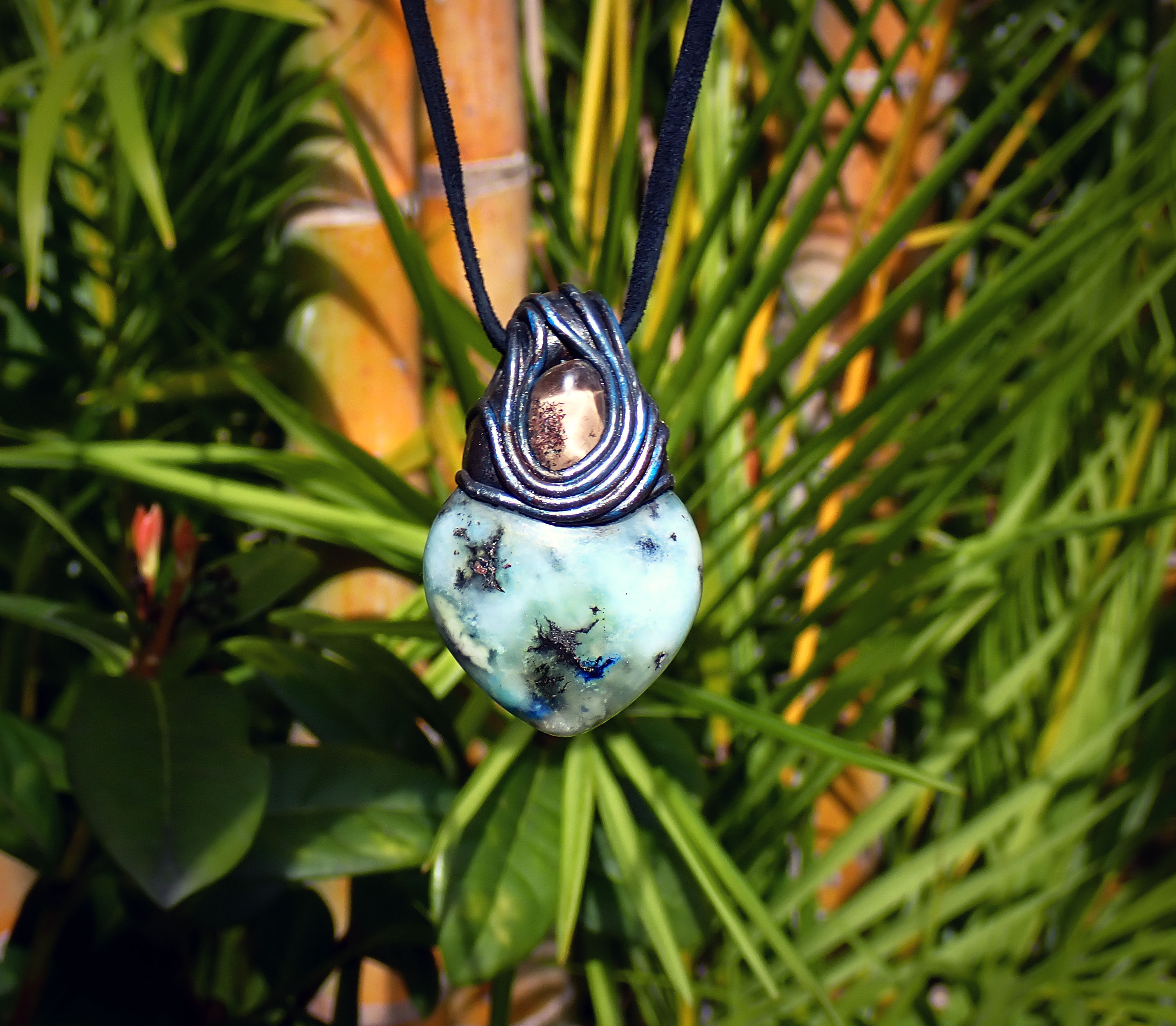 2. Quantum Quattro & Shaman Quartz Pendant