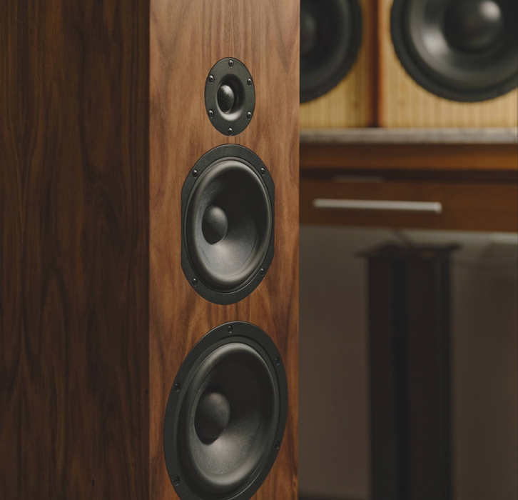 CSS Audio speaker drivers, crossover components, and DIY speaker kit assembly on workbench