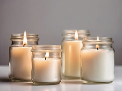 candles in a clear jar white background.jpg