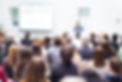 Speaker Giving a Talk at Business Meeting. Audience in the conference hall. Business and E