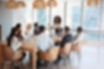 Businesswoman Stands To Address Meeting