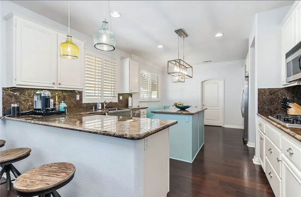 VB Painting Services painting an elegant kitchen interior in Temecula with attention to detail