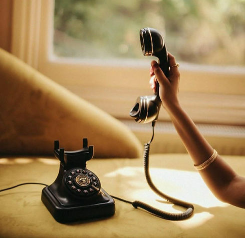 Vintage phone being picked up