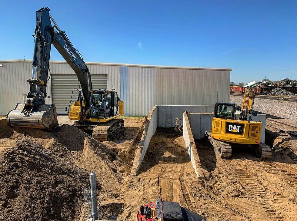Heavy civil construction crew performing sitework excavation and earthmoving for a large-scale infrastructure d