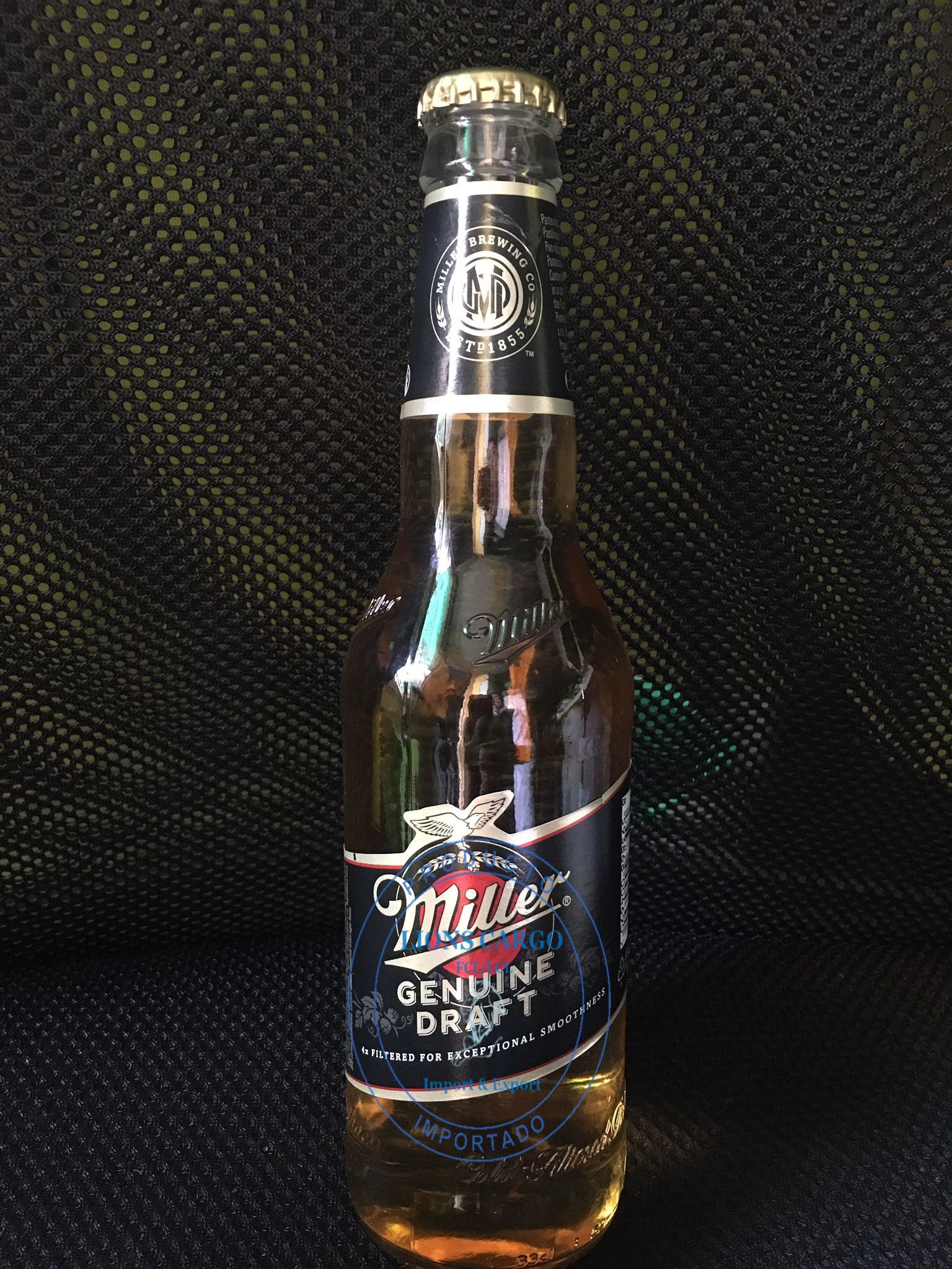 CERVEZA MILLER Genuine Draf 4% AL BOTELLA  33 CL