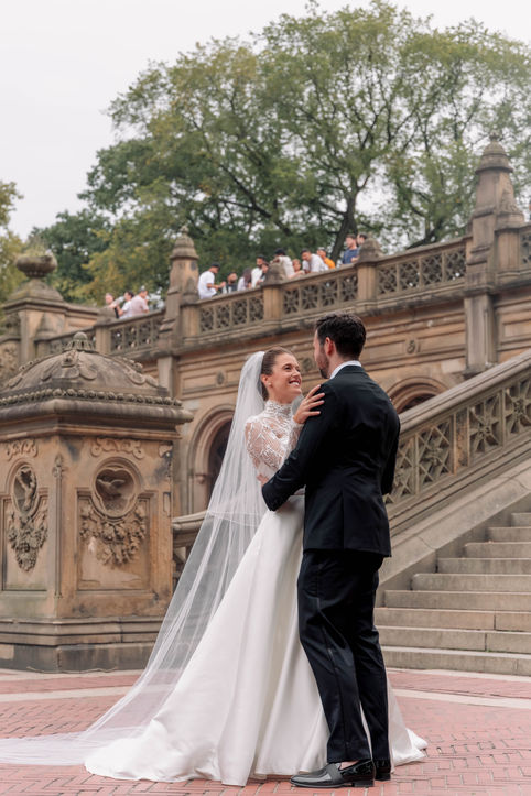 Chic Manhattan wedding at the Central Park Boathouse with timeless lakeside bridal portraits.