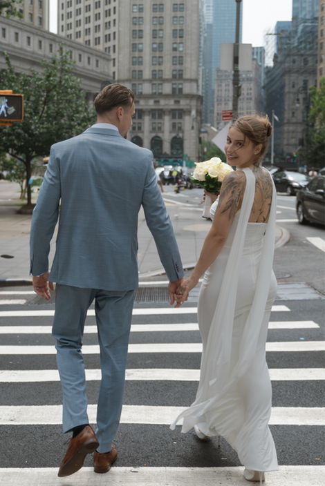 Intimate candid moment between newlyweds documented in an editorial style by a luxury documentary wedding photographer in New York City