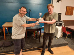Carl Davies receiving the winners trophy