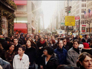 A crowded New York City sidewalk.