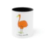a white mug with a printed orange bird and yellow beak and legs with text that reads "i like burds"