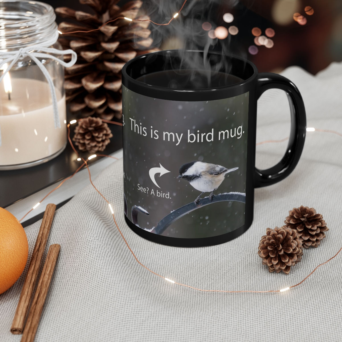 a mug with a black and white chickadee and text reading "this is my bird mug" and "see a bird"