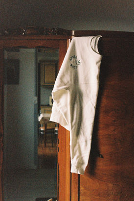 The classic Après Ski Sweater hanging in the closet