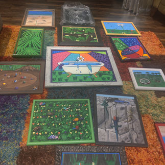 Laying out the artwork on the floor.