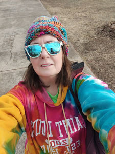 Me headed out, looking super fashionable for my New Year walk carrying a soft suitcase.