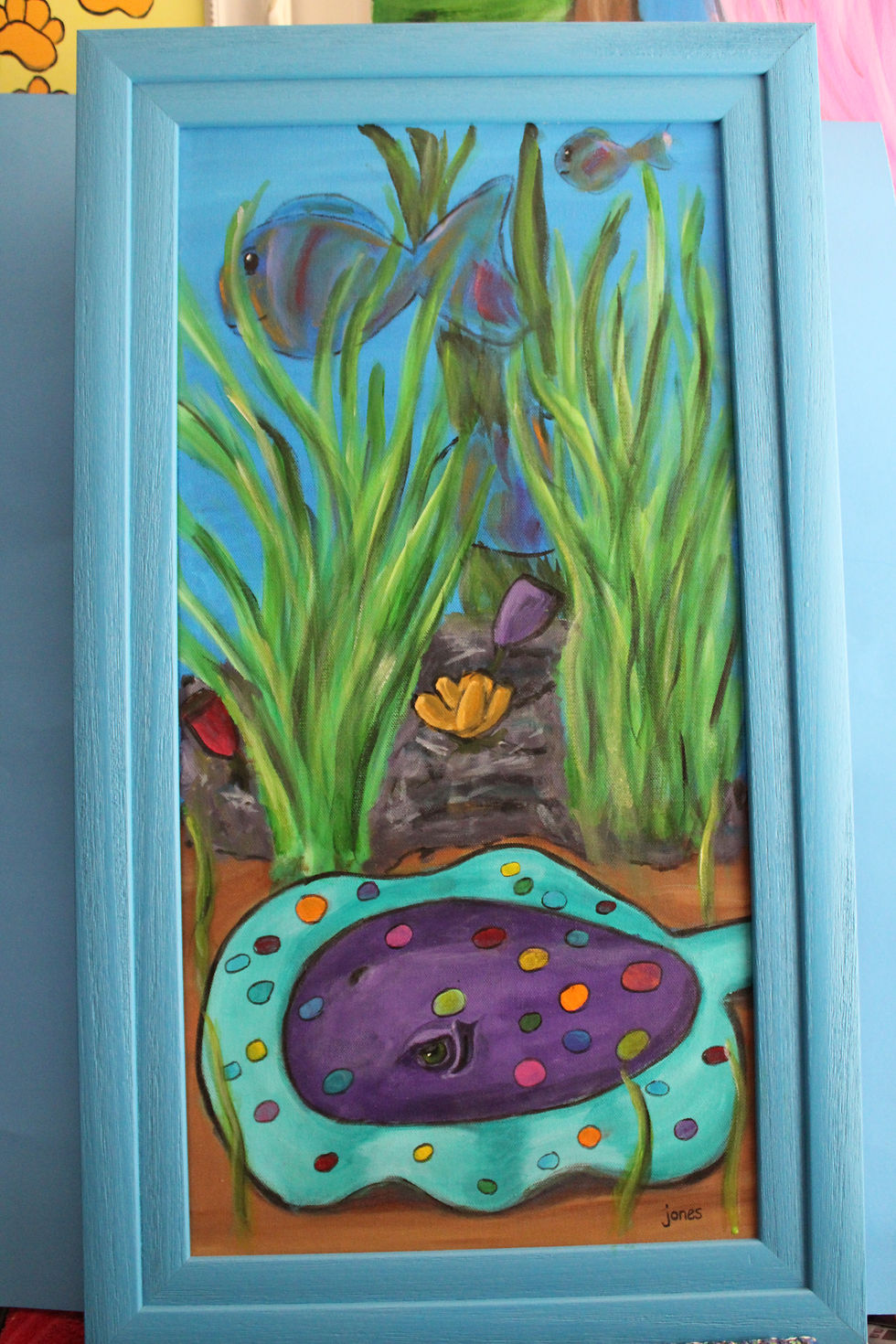 Stingray painting with coral background in progress for Midwest City Library art exhibition, awaiting a name.