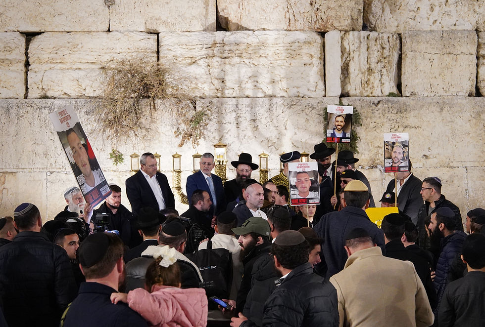 Jerusalem Israel 25.12.2024 Representatives of the families of the hostages at the ceremony of lighting the first candle of Hanukkah at the Western Wall with the participation of the chief rabbis