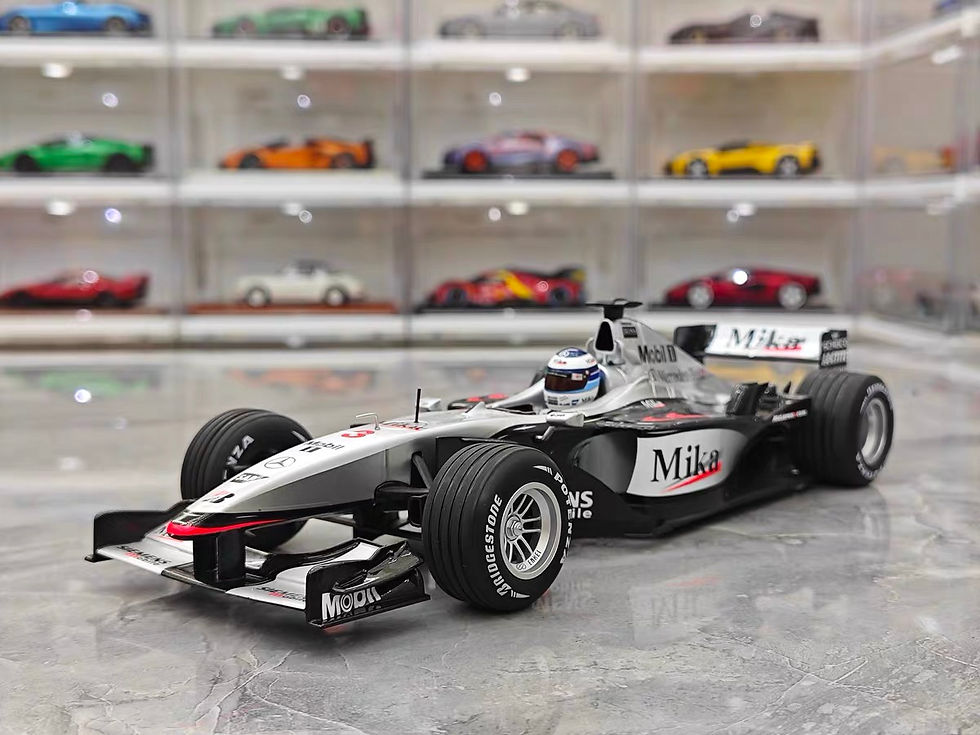 Thumbnail: Mini Cut McLaren Mercedes MP4/16 Häkkinen Die-Cast Model 1:18