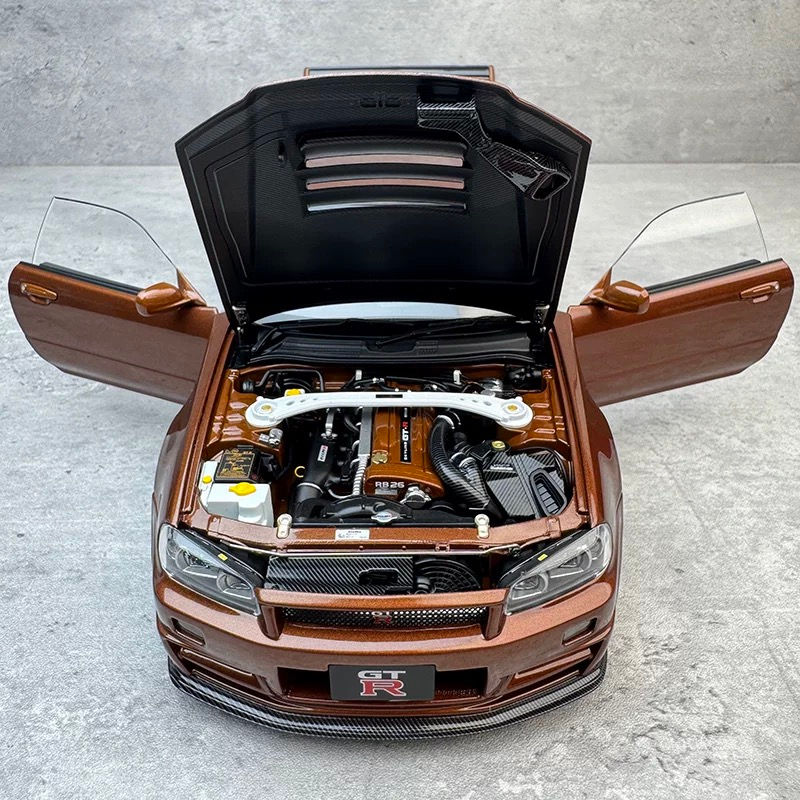 Thumbnail: MH 1:18 Nissan Skyline GT-R R34 Metallic Bronze Die-Cast Car Model