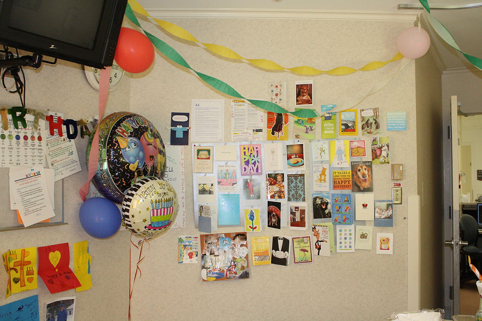 The birthday cards displayed in Art's hospital room.
