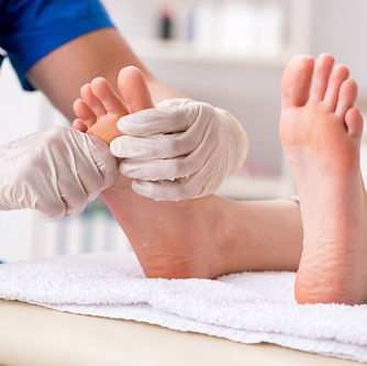 A foot care nurse is providing Mobile Foot Care Service