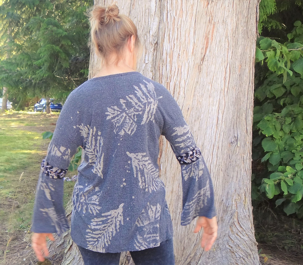 Thumbnail: Fuzzy Cuddly Top with Unique Lace Up Detail on the Long Bell Sleeves