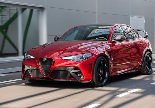 Red four door sports sedan
