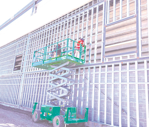 workers secure storm shelter.jpg
