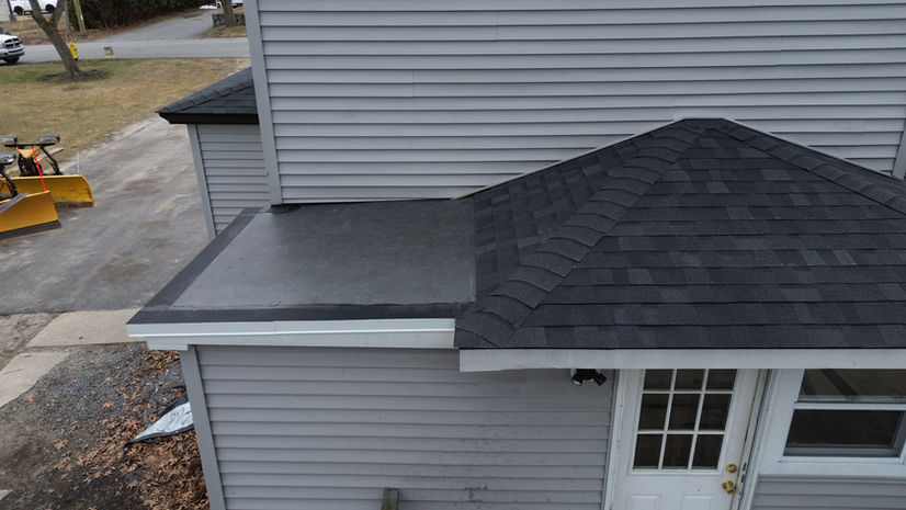 New asphalt shingles installed on a residential side roof in Leominster, MA
