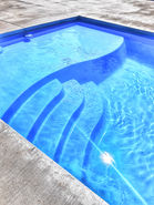 River Pools D36 Fiberglass Pool in Marinette WI by Pool Pros.