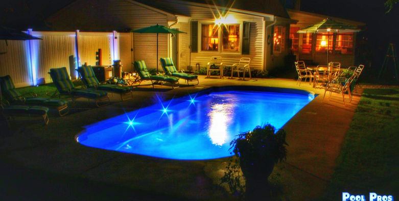 A beautiful classic roman fiberglass pool in Olde Allouez, WI by Pool Pros