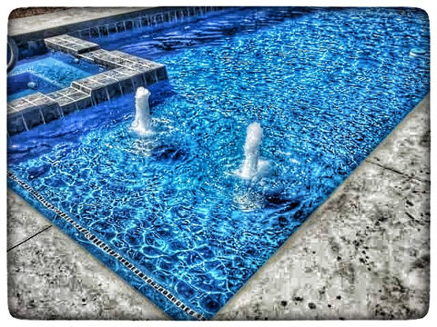 The Ultimate 35 Fiberglass Pool with integrated spa in Larsen WI by Pool Pros
