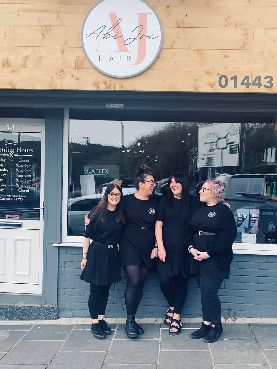 Girls front of salon portrait.jpg