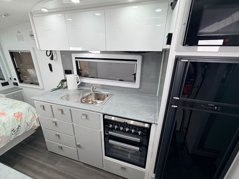 Thumbnail: Hilltop H18 caravan bedroom with storage – compact Australian-built touring caravan