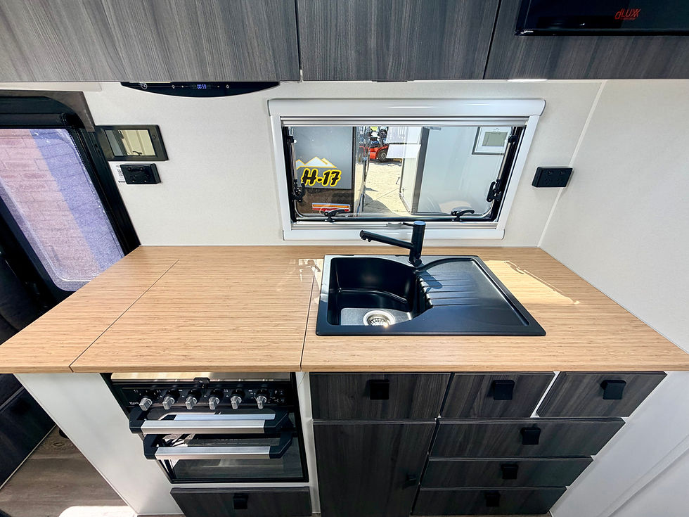 Thumbnail: Hilltop Thredbo 22 foot caravan kitchen – premium cabinetry and appliances in luxury Australian-built caravan