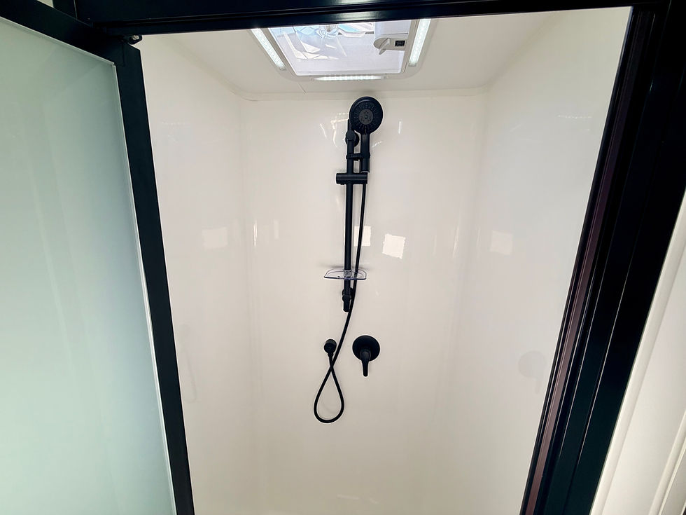 Thumbnail: Hilltop Thredbo caravan ensuite toilet and sink – modern bathroom in luxury Australian-built caravan