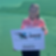 Oonagh Cattigan holding NI Running Show sign at Elken Belfast, February 2024. NI Running Show