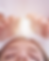 Hands above a person's head, glowing light, Energy Healing is performed.