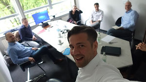 Tom in business meeting.JPG