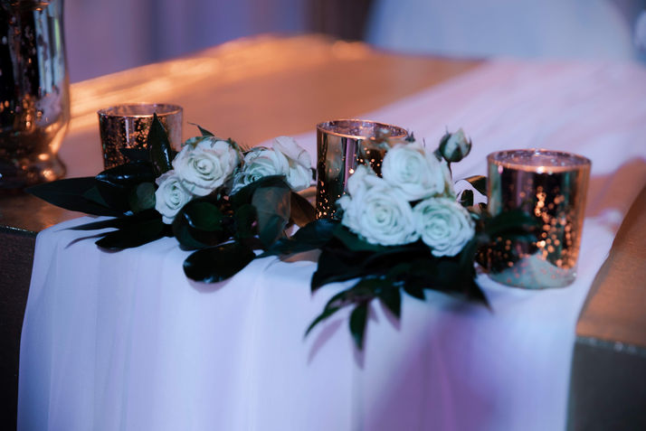 Seven Ten White Flowers and Greenery Surrounded by Mercury Glass